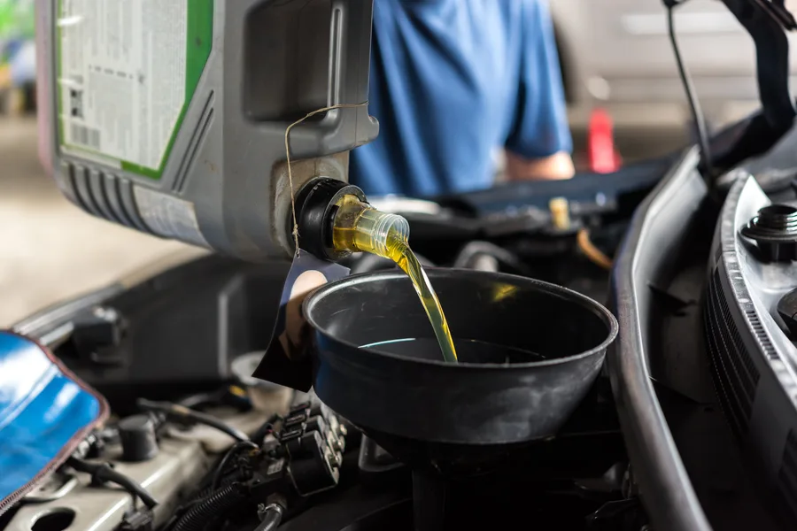 Fresh oil poured during an oil change